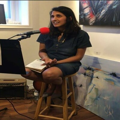 Mariam Qureshi in the Studio: Me at an artist talk reading an exert from H.D. Thoreau's Civil Disobedience, when asked what I think art is.