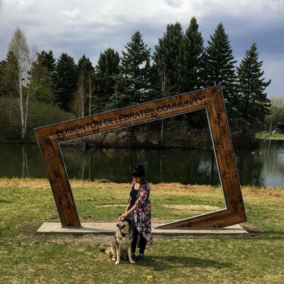 Mariam Qureshi in the Studio: Me and my dog at one of my outdoor art exhibit, which I am going to be doing across Canada during the summer months of 2021.