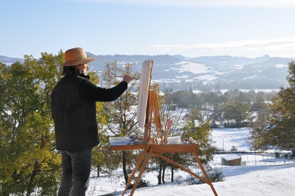 Anne Baudequin im Studio: Painting from the terrace of the artist's studio, view of the Monts du Velay, Auvergne, France