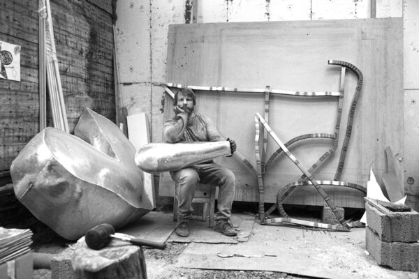 Peteris Lidaka in the Studio: This photograph was taken during the work process while creating the large-scale stainless steel sculpture "Wind cacher" for the Cēsis Art Festival, 2020