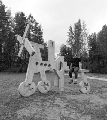 Peteris Lidaka in the Studio: This photo was taken just after the installation of my large-scale concrete airplane sculpture in a rural open-air sculpture garden in 2023.
