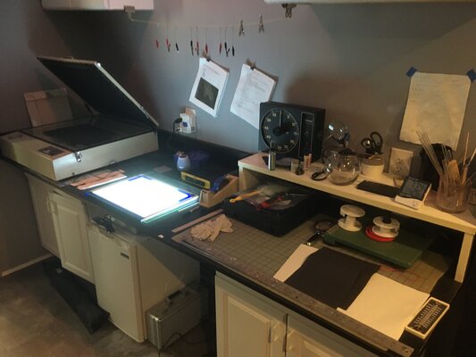 Mark LaRiviere nello studio: This is my platinum/palladium printing equipment. On the left is a vacuum contact exposure lightbox. On the right, the area where I apply sensitizer to paper.