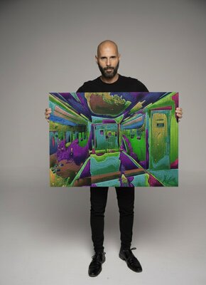 Juan Diego Quintero López nello studio: Un tamaño nos permite visualizar con más detalle la estructura y dimensión de la obra de arte digital.