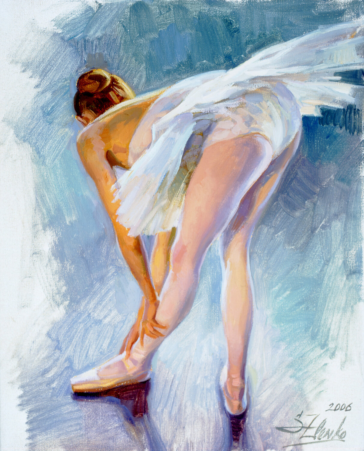 Ballerina adjusting her pointe shoes. Serguei Zlenko