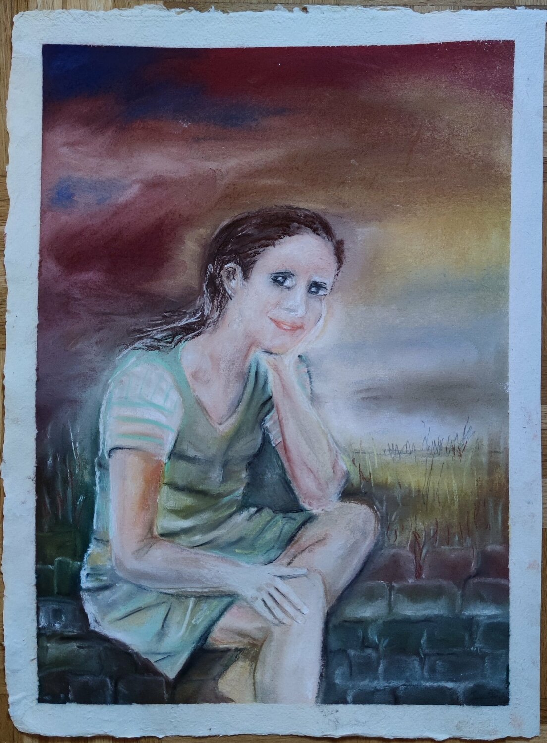 Mädchen sitzend auf einer Mauer Birgit Günther