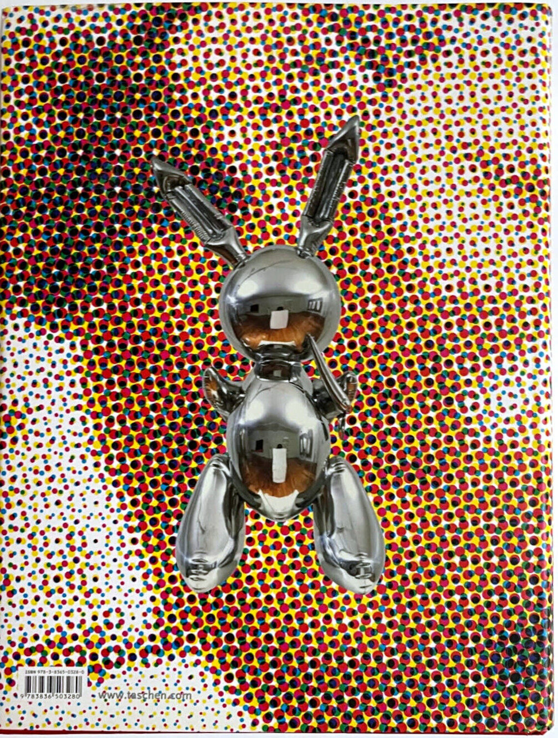 Lavishly illustrated 592 page monograph (hand signed by Jeff Koons