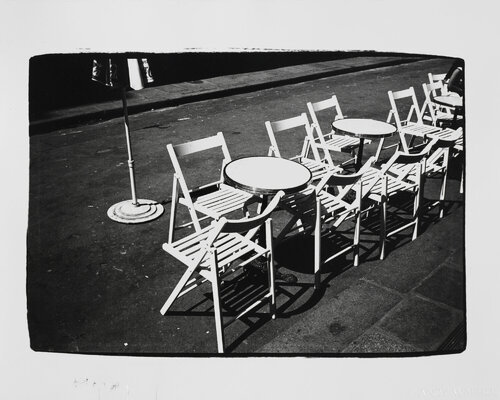 Gelatin silver print of Cafe Chairs and Tables on Street by Andy Warhol di Andy Warhol, Fotografia in vendita su Singulart