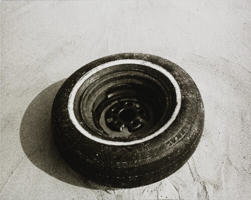 Gelatin silver print of Tire in Sand by Andy Warhol van Andy Warhol, Fotografie te koop op Singulart