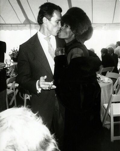 Arnold Schwarzenegger with Grace Jones at his wedding to Maria Shriver, Hyannis Port, MA, 1986 van Andy Warhol, Fotografie te koop op Singulart