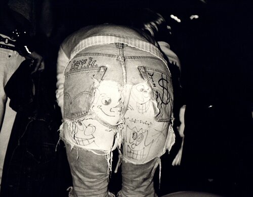 Photograph of Blue Jeans with designs by Haring, Scharf and Warhol di Andy Warhol, Fotografia in vendita su Singulart