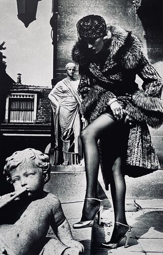 Woman in Coat Adjusting Stocking, Paris 1975 by Helmut Newton, Photography for Sale on Singulart