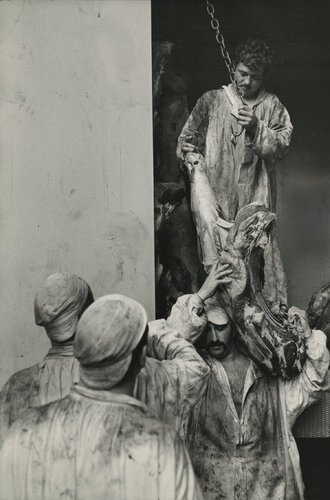 Butcher at Saint-Honore market place, Rue Danielle-Casanova, Paris par Henri Cartier-Bresson, Photographie en vente sur Singulart