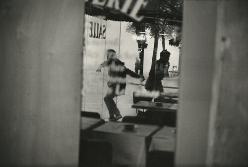 Protester with brickbat, 6th Boulevard St Michel, Paris par Henri Cartier-Bresson, Photographie en vente sur Singulart