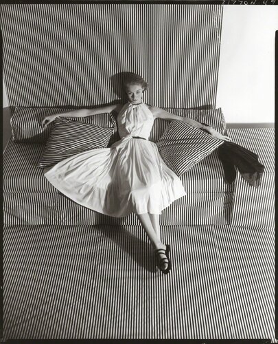 White Dress on Striped Sofa II di Horst P. Horst, Fotografia in vendita su Singulart