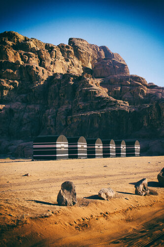 In one of these tents, a couple makes love de Grégory Herpe, Fotografía a la venta en Singulart
