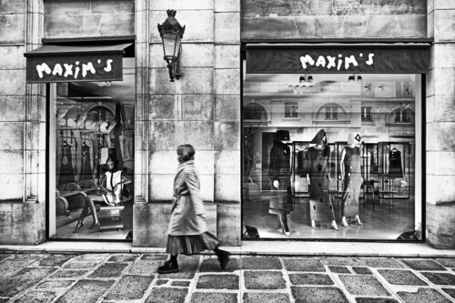 A Parisian woman walks towards love by Grégory Herpe, Photography for Sale on Singulart