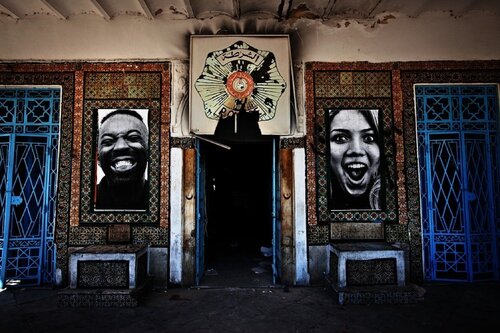 INSIDE OUT - Tunisia, Front of the Police Station of La Goulette di JR, Fotografia in vendita su Singulart