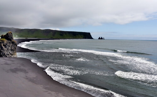 Black Sand Beach By the Ocean di Alain  Goulet, Fotografia in vendita su Singulart