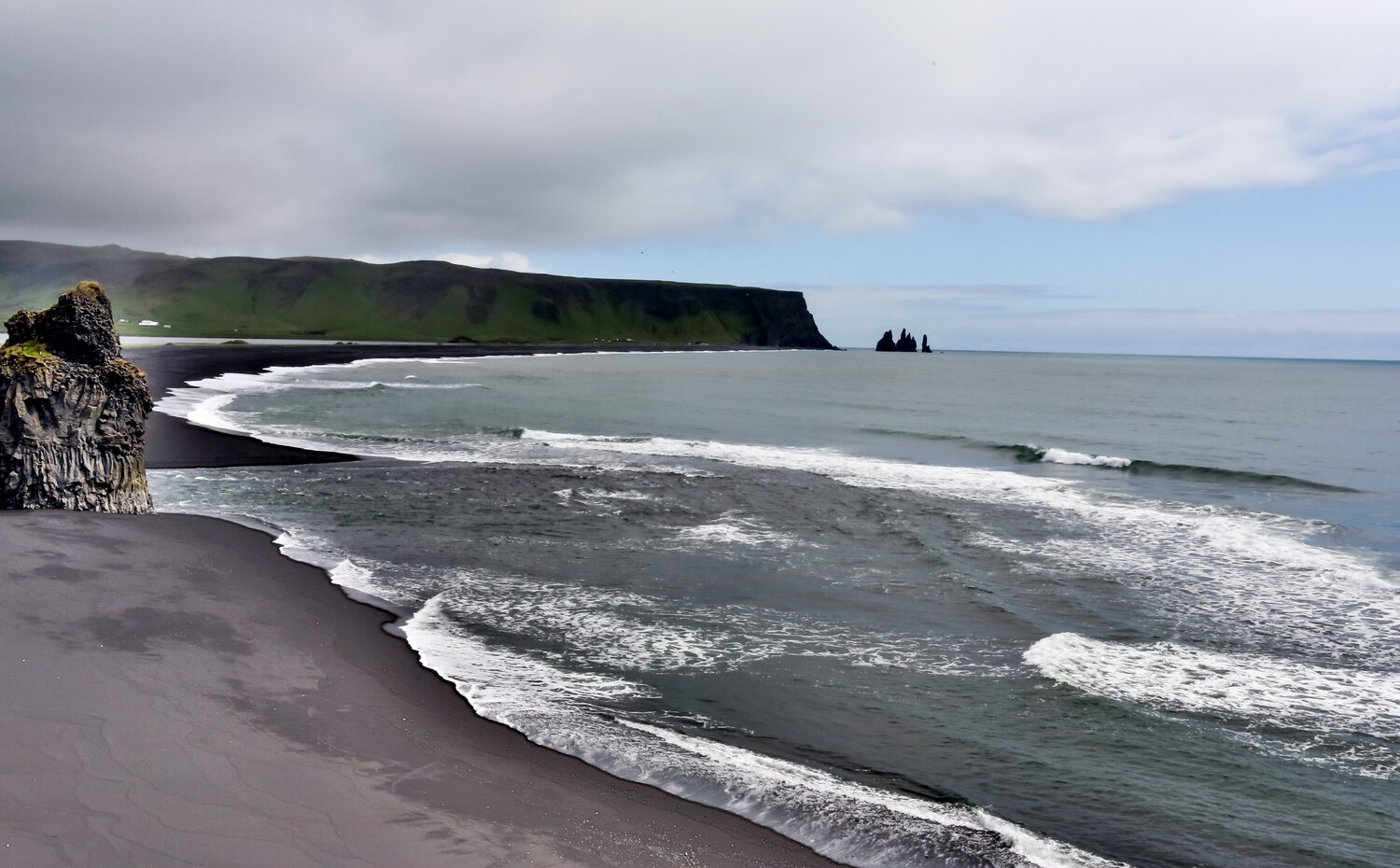 Black Sand Beach By the Ocean Alain  Goulet