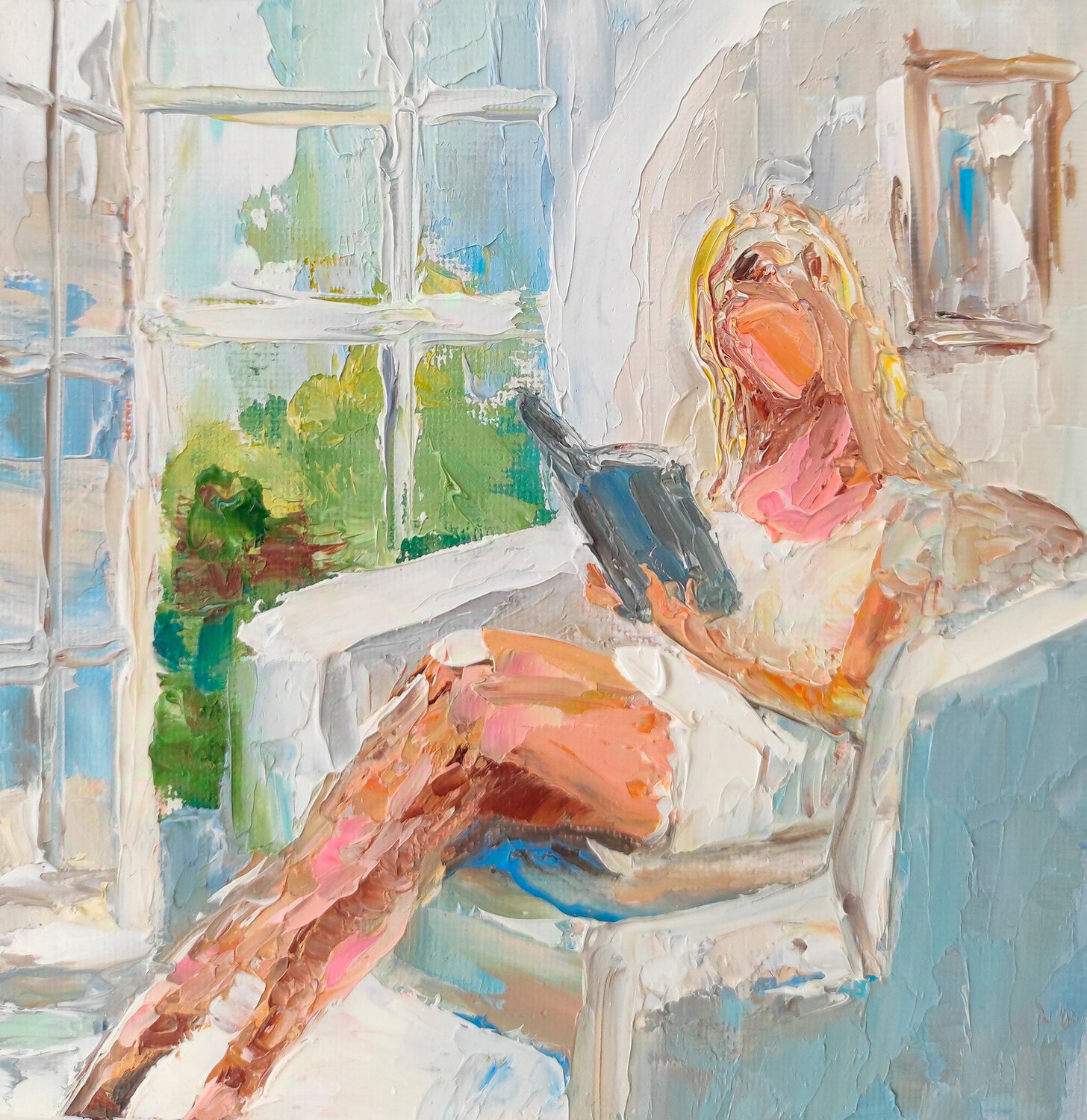 Reading blonde girl Maria Slynko