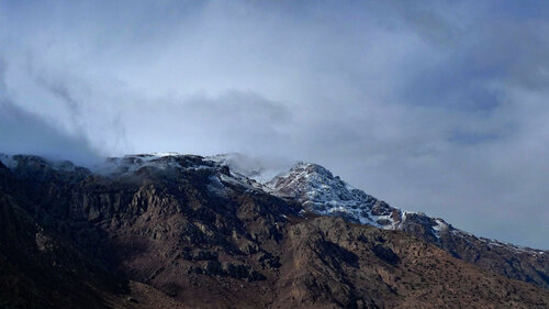 Snow capped Atlas mountain John Brooks