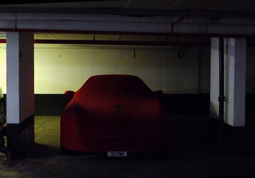 Red wrapped car John Brooks
