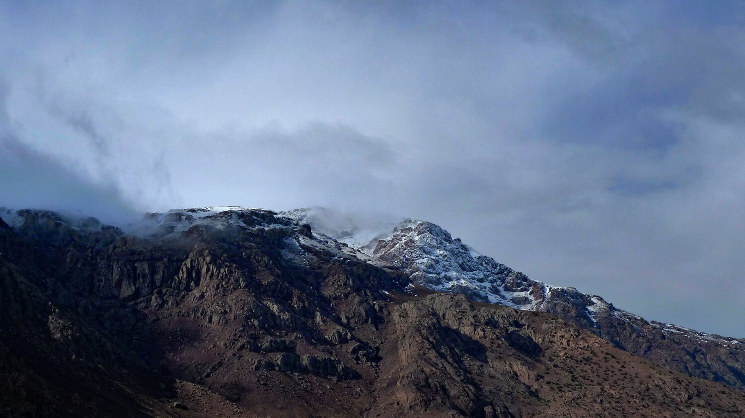 Snow capped Atlas mountain John Brooks