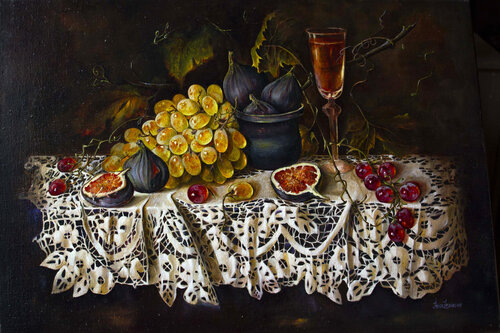 Grapes and figs on a lace tablecloth Inga Loginova