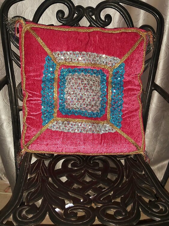 Last piece  50% off Moroccan handmade , jeweled patchwork ،  wax used ,double faced cushion for interior decoration   This pillow is not just a piece of furniture, but a decorative piece that reflects the beauty and culture of the Northeast. It will be a Hend Al-Batesh