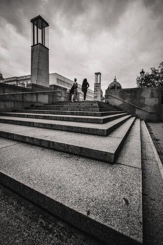 Stairs and girls in the middle an a gloomyday in Berlin. by ihsan Okur, Photography for Sale on Singulart