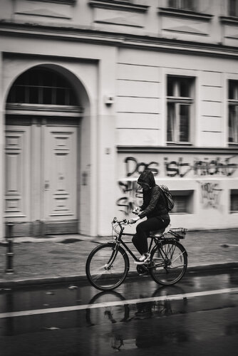 A cyclist is crossing the street. Panning and flue background. by ihsan Okur, 사진 for Sale on Singulart