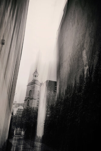 A perspective street view with a church in the background. von ihsan Okur, Fotografie kaufen auf Singulart