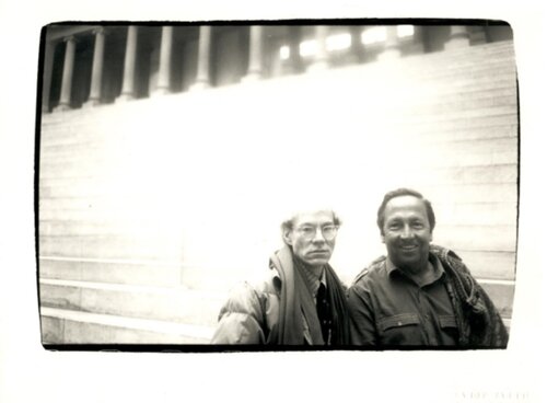 Andy Warhol and Robert Rauschenberg outside the Pergamon Museum in Berlin di Andy Warhol, Fotografia in vendita su Singulart