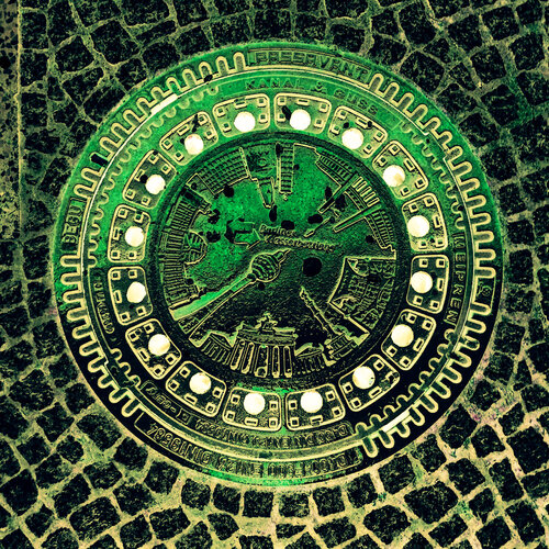 Berlin Gullideckel grün by Nina Florence Juncker, Photography for Sale on Singulart