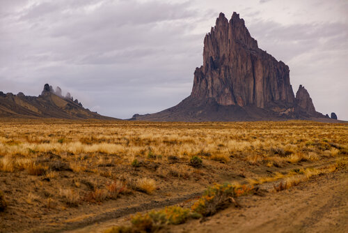 Shiprock After Rain – New Mexico Desert Light van Robert Niemeier, Fotografie te koop op Singulart
