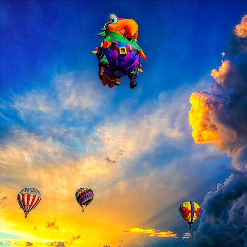 Balloon Parade at Sunset – Colorful Hot Air Balloons Over Dramatic Sky – Albuquerque Balloon Fiesta Photography di Robert Niemeier, Fotografia in vendita su Singulart