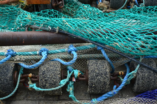 Fischernetze in blau und türkis an der Pier by Klaus Schreiber, Photography for Sale on Singulart