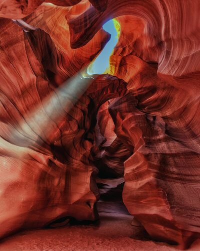 Light Path traveling thru opening in Antelope Canyon, Arizona, US van Lev Kaytsner, Fotografie te koop op Singulart