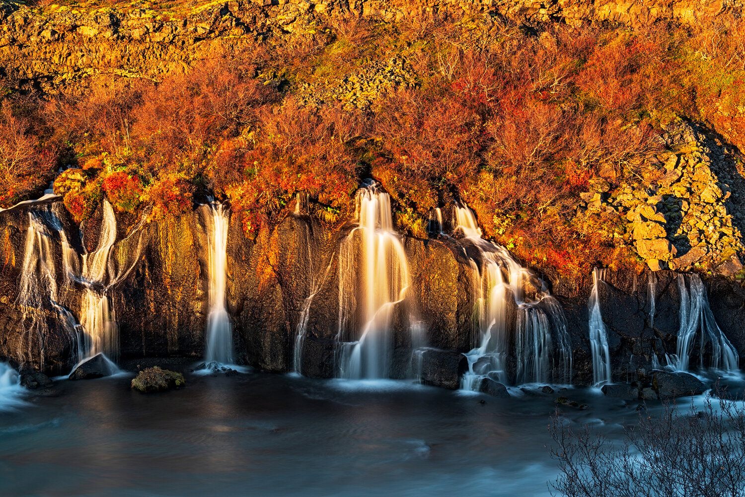 Hraunfossar Waterfall at Sunset in Autumn Season, Iceland Luigi Morbidelli Fotografie zu verkaufen