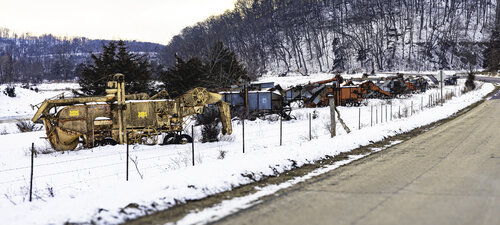 Retirement Row of Agriculture Equipment during Wisconsin Winter di Bob Felderman, Fotografia in vendita su Singulart