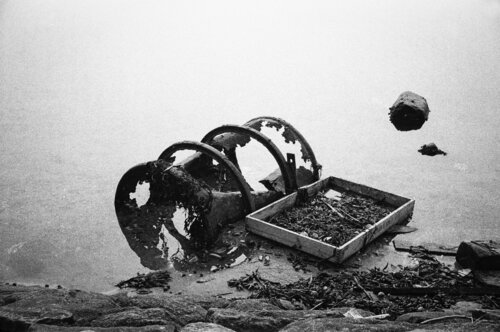 1973 | Still life of Oil Drum & Sieve - Bretagne, France | 70s Seventies van Robbert Frank Hagens, Fotografie te koop op Singulart