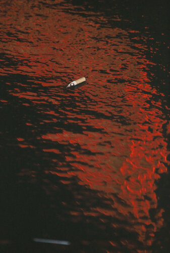Flaque de lumière "Le mégot" by Philippe Hervé, Photography for Sale on Singulart
