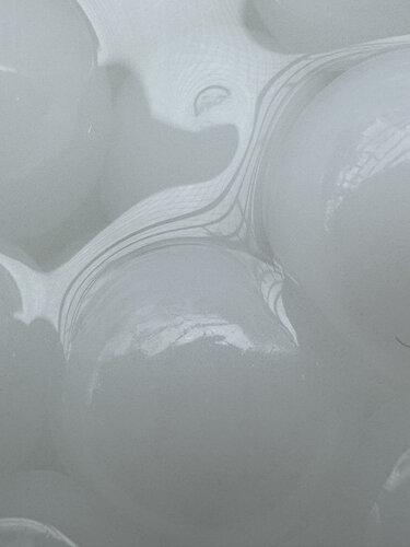 Orbeez White (Photograph on acrylic with silver-splattered edges, causing a reflection of the photo). von Renato Gosling, Fotografie kaufen auf Singulart