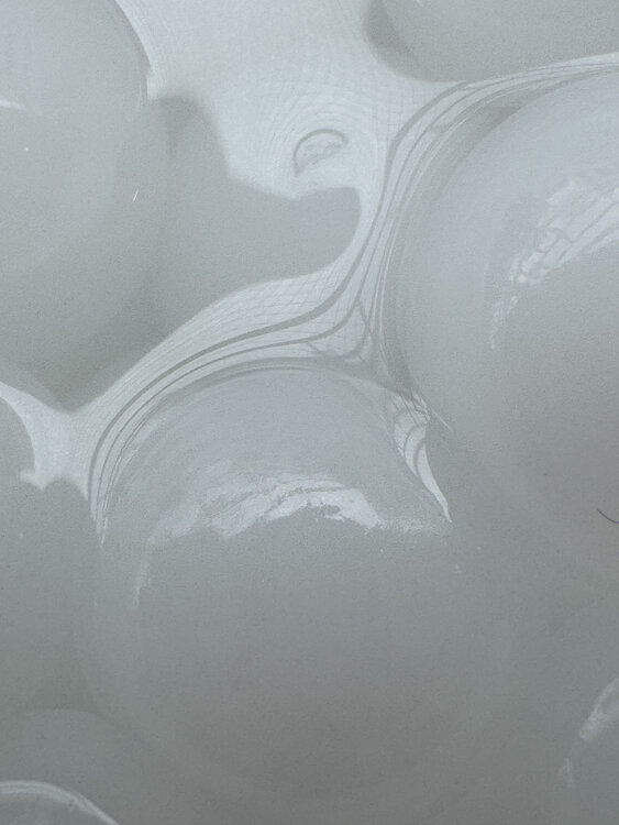 Orbeez White (Photograph on acrylic with silver-splattered edges, causing a reflection of the photo). Renato Gosling