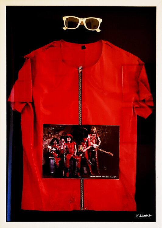 New York Dolls      ( Fetish Rubber T -shirt and sun glasses, picked up in the dressing room in NY.  Comes  in a hand built Plexiglas and Wood frame ) Thomas Dellert