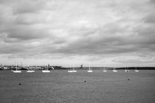 Island Estate - Riverview and Boats (B&W) van Emmanuella Maeba, Fotografie te koop op Singulart
