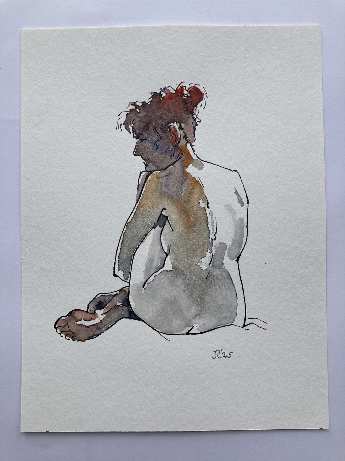 Ivonne sitting from the back John Rabou