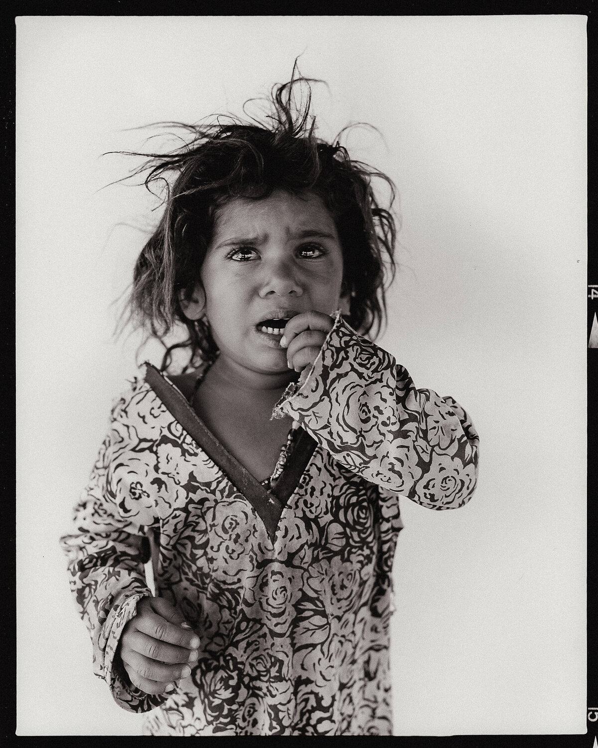 Crying girl Mamad Mossadegh Fotografie zu verkaufen