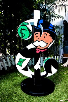 Dollar Sculpture ft. Scrooge, Donald Duck, Mr. Monopoly from Currency Street Art Series Carlos Pun
