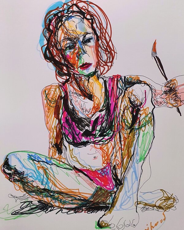 Eine Künstlerin imit einem Pinsel Karibou